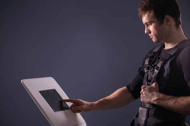 A close-up shot of a TSA officer operating an advanced imaging technology (AIT) scanner, with a screen displaying a clear, detailed image of a passenger's body.
