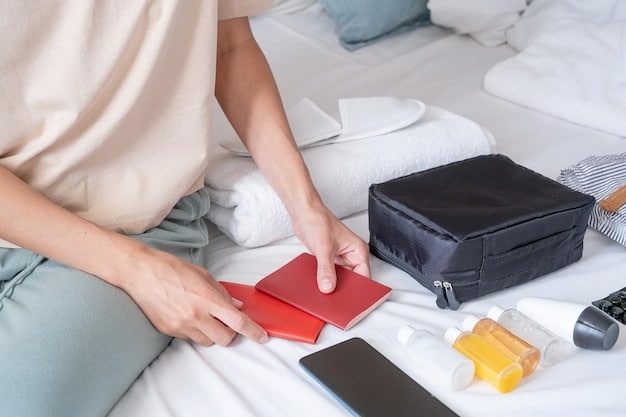A person efficiently packing a suitcase using packing cubes, with a travel-sized toiletries kit visible near the top. The setting is a well-lit bedroom with a partially packed suitcase on the bed.