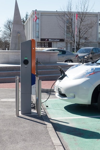 A modern electric car parked at a charging station in front of a row of solar panels, set against the backdrop of a sunny, eco-conscious neighborhood, symbolizing the integration of renewable energy and sustainable transportation.