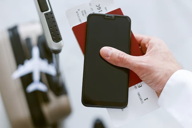 A close-up of a smartphone displaying an airline's loyalty program app, showing a passenger's mileage balance and available rewards. There are icons for flights, hotels, and car rentals, symbolizing the various redemption options. The screen is lit up, drawing attention to the digital rewards system.