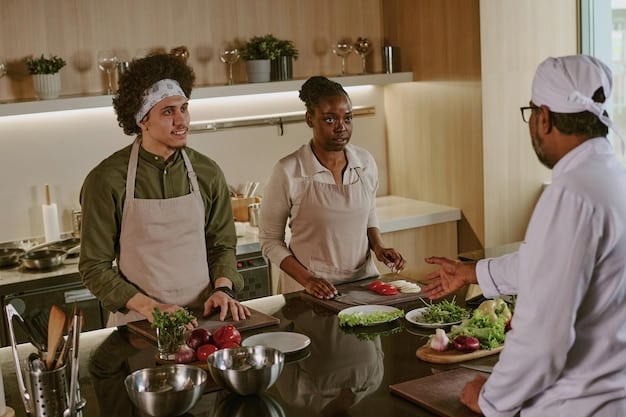 A close-up of a chef in a private kitchen teaching a small group of luxury travelers how to prepare a regional dish. The kitchen is modern and high-end, with fresh, local ingredients displayed prominently.