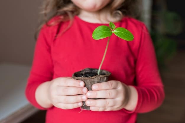 A close-up shot of a person holding a small tree seedling, with a blurred background showing a reforestation project in action. The image signifies carbon offsetting through tree planting and environmental restoration efforts.