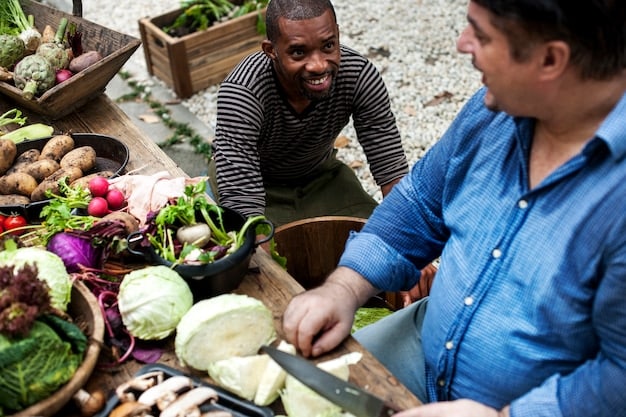 A group of diverse tourists participating in a hands-on workshop with local farmers in a rural area of the US. They are learning about sustainable agricultural practices and the importance of fair trade in supporting local farmers and their families.