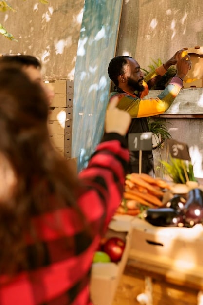 A vibrant local market in a small US town, with vendors selling handmade crafts and locally sourced food. The image highlights the economic benefits of supporting local communities through tourism.