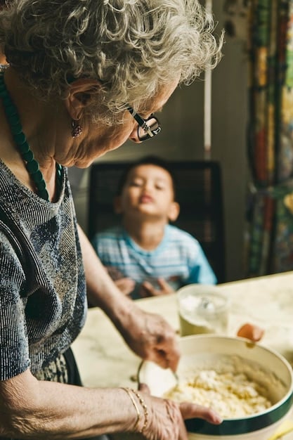 A close-up of a traveler's hands learning to make traditional pasta from an Italian grandmother in her sun-drenched kitchen. The focus is on the hands working together, showing the personal connection and hands-on learning experience.