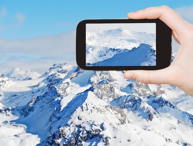 A screenshot from a VR travel experience showing the user standing on the summit of Mount Everest, with a panoramic view of the surrounding Himalayan peaks under a clear blue sky.