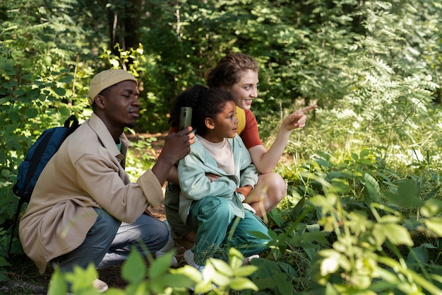 A group of tourists participating in a tree-planting activity in a rural area, highlighting the concept of offsetting carbon emissions and supporting local ecosystems.