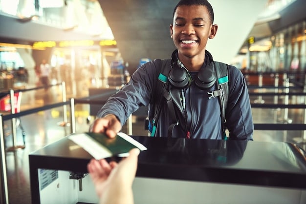 A smiling traveler showing their TSA PreCheck card to a TSA agent at an airport security checkpoint, highlighting the ease and convenience of the process.